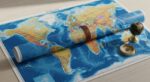 The Explorer's Perspective - Physical World Map Poster with Globe Accent